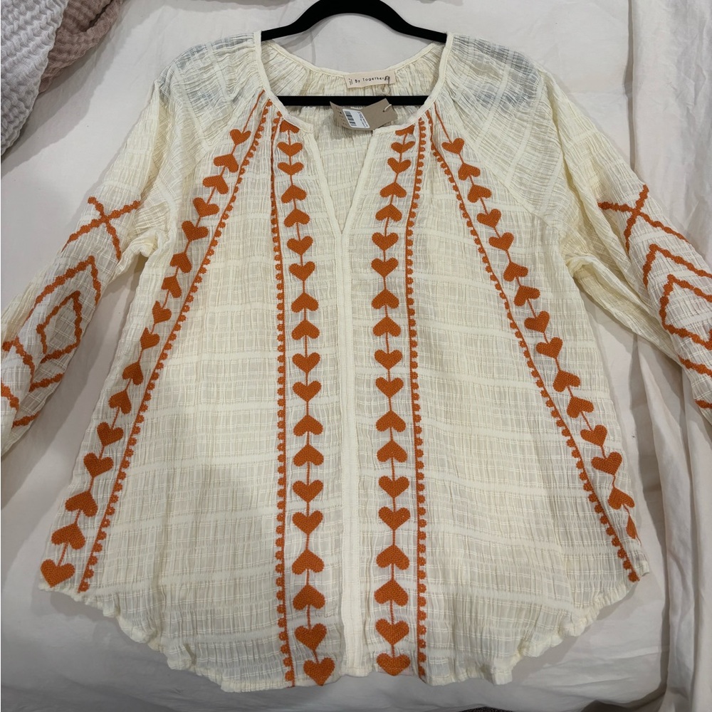 White and orange blouse
